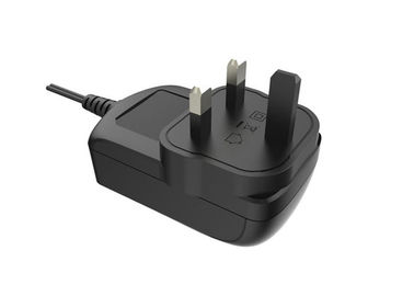 kopen De zwarte Britse Stopmuur zet Machtsadapter 12V 2A met de Goedkeuring van Ce op EMC online manufacture